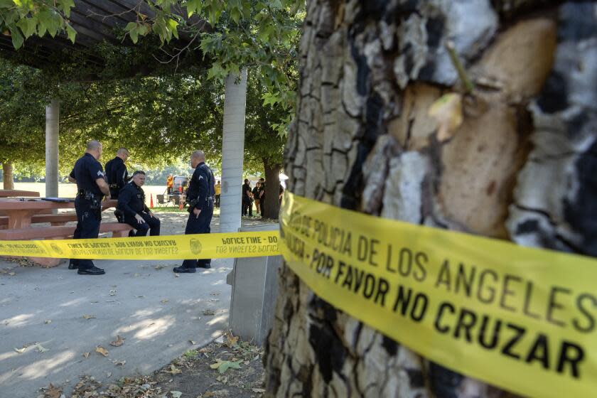 ENCINO, CA - JUNE 25: Ten Los Angeles Fire Department firefighters were injured Monday afternoon battling a fire at a homeless encampment near the Hjelte Sports Center in Encino, CA. Investigators were still at the scene Tuesday morning Tuesday, June 25, 2024. (Myung J. Chun / Los Angeles Times)