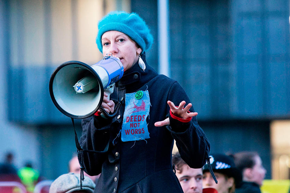 Co-founder Gail Bradbrook speaks to activists blocking a road in Central London on Oct. 9. | George Cracknell Wright—LNP/Shutterstock
