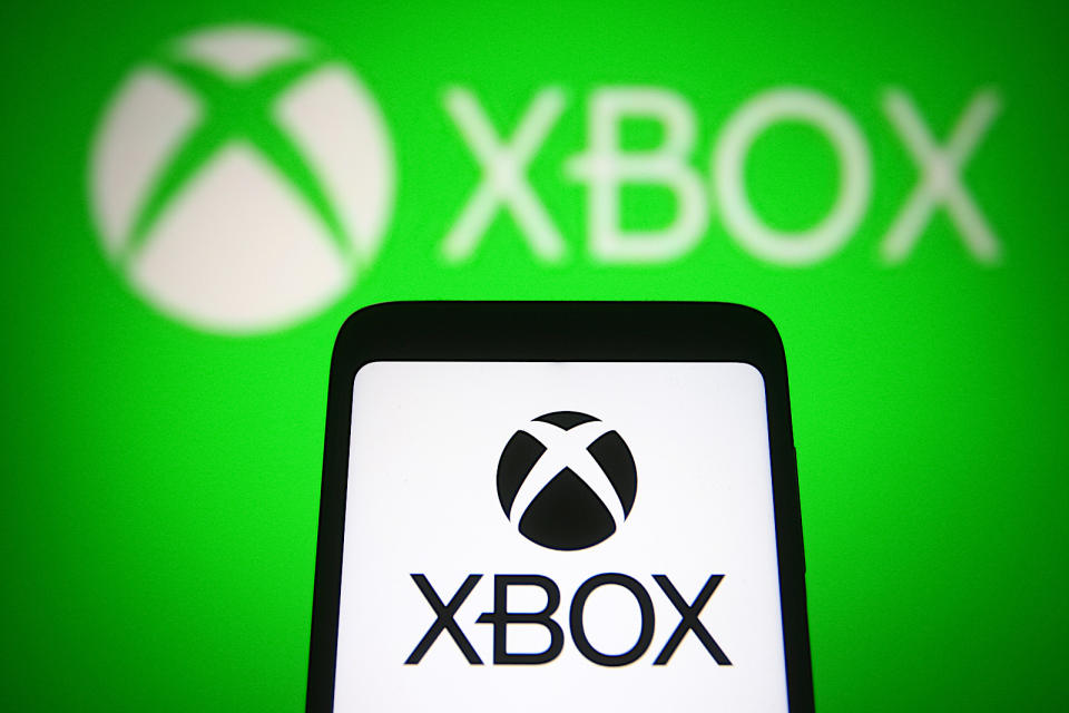 UKRAINE - 2021/06/11: In this photo illustration a Xbox logo of a video gaming brand is seen on a smartphone and a pc screen. (Photo Illustration by Pavlo Gonchar/SOPA Images/LightRocket via Getty Images)