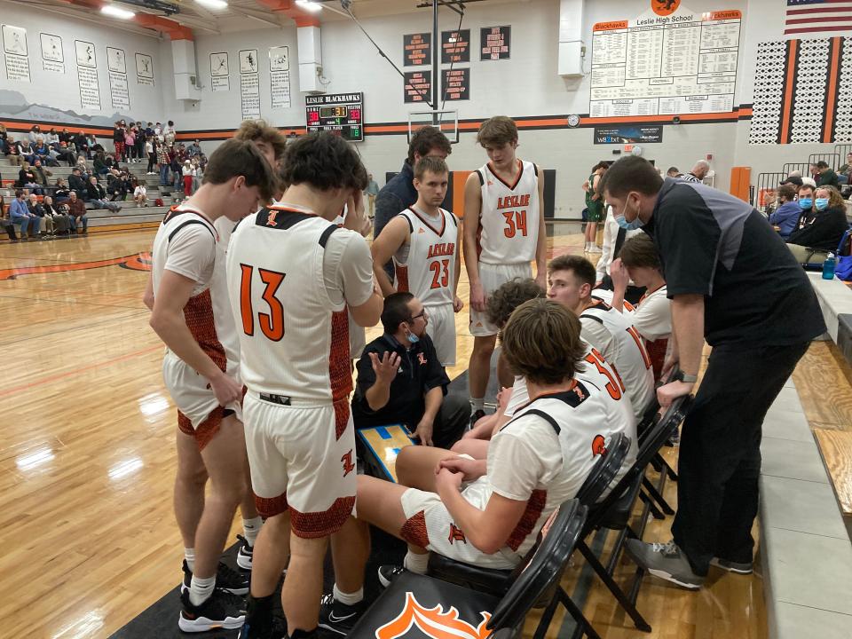 Leslie boys basketball coach Matt Johns talks to his team during a timeout on Jan. 28, 2021. Leslie has won four straight after posting a 39-37 win over Olivet.