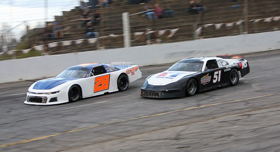 Ray Alfalla (51) battles Bub Haney (28) during the Limited Late Model feature as part of the Fall Brawl at Hickory Motor Speedway on November 12, 2022. (Adam Fenwick/NASCAR)