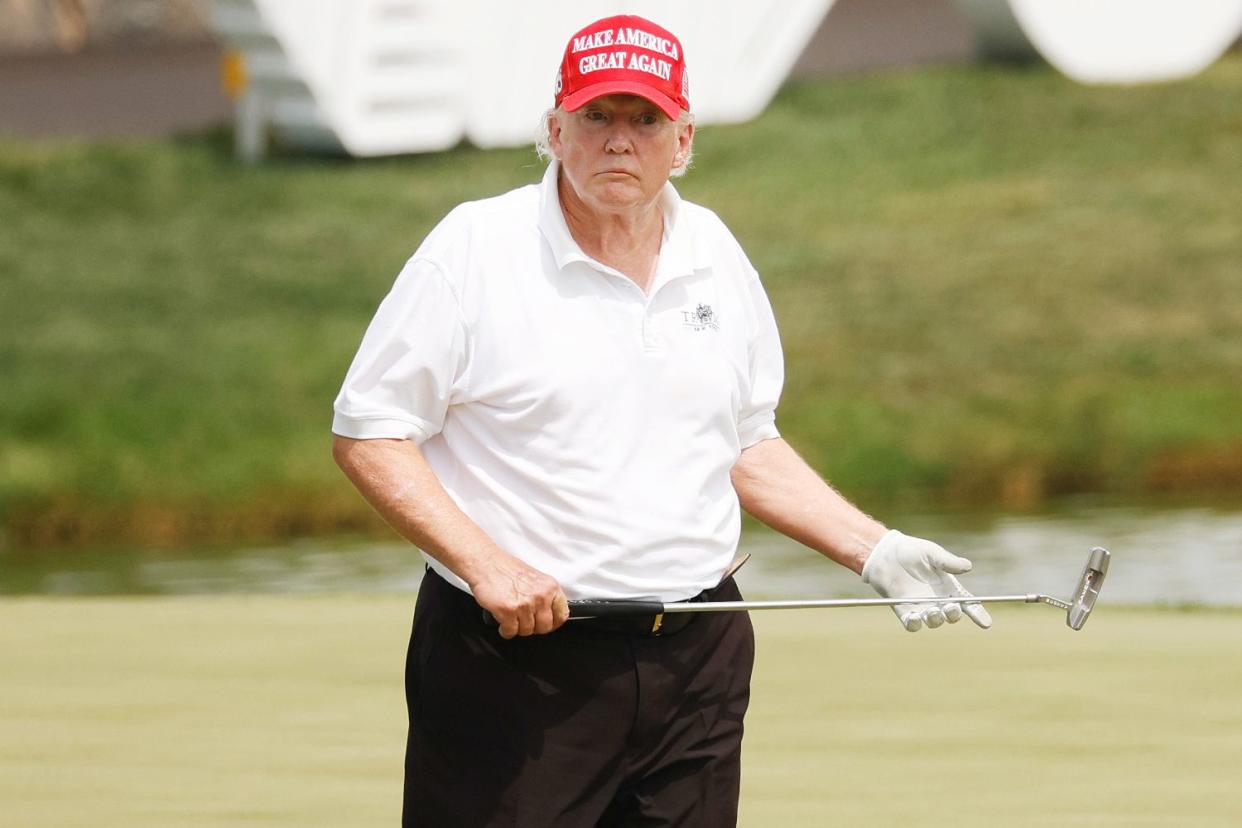 <p>Cliff Hawkins/Getty</p> Former President Donald Trump during the LIV Golf Invitational at Trump National Golf Club Bedminster on July 28, 2022