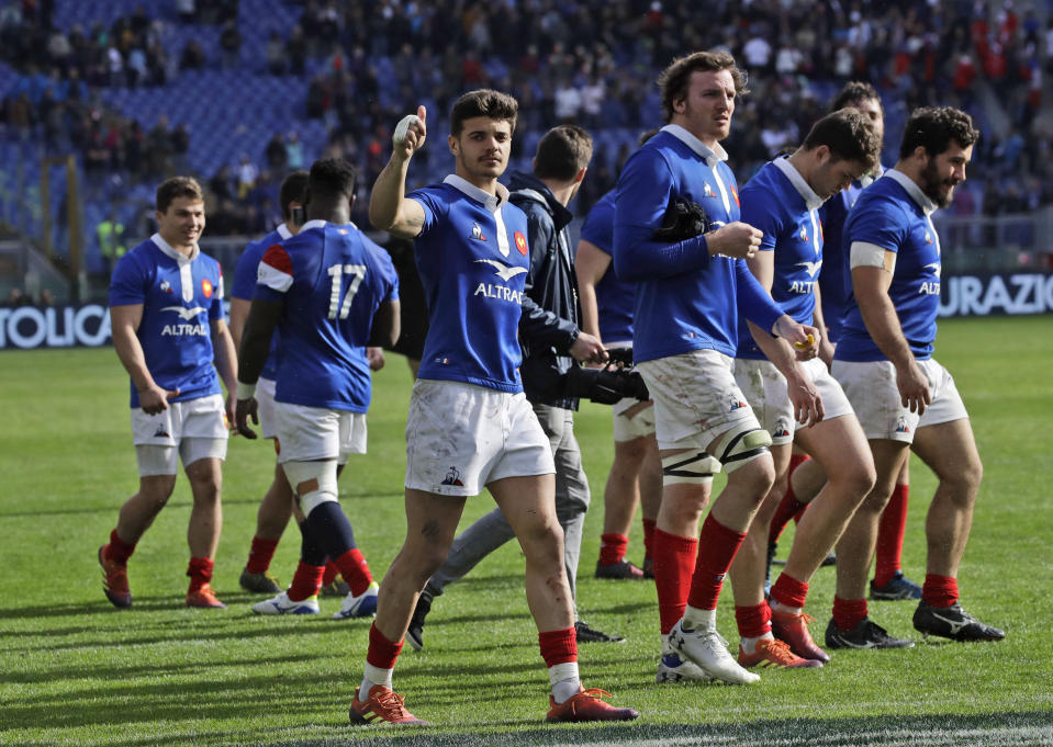 France's players salute their supporters after beating Italy 25-14 in a Six Nations rugby union international match at the Rome Olympic stadium, Saturday, March 16, 2019. (AP Photo/Alessandra Tarantino)