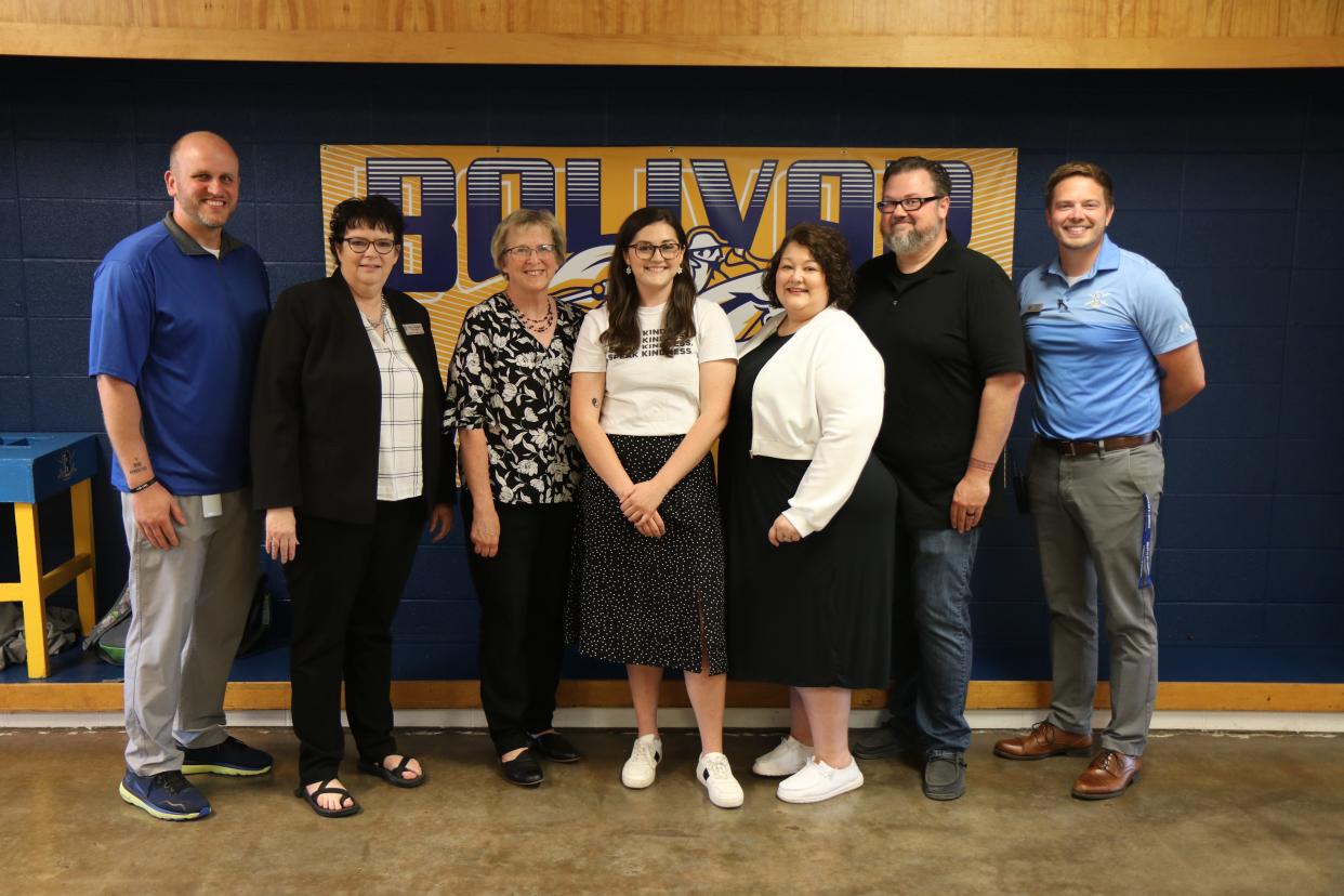 Lyndsey Roseler, center, won the Milken Educator Award. From left: Zach Julian, assistant principal of Bolivar Middle School; Betty Glasgow, supervisor at University of Central Missouri; Ann McCoy, dean of UCM; Lyndsey Roseler; Alysha and Kevin Roseler, Lyndsey's parents; and Ben Potter, principal of Bolivar Middle School.