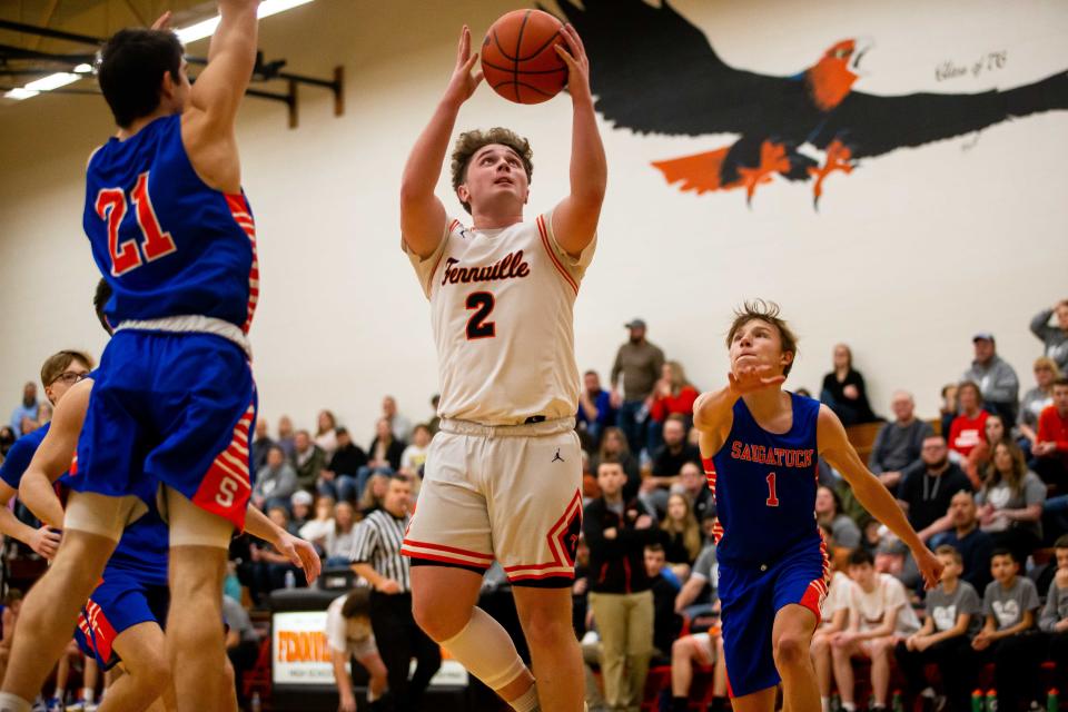 Fennville's Ben Peterson takes a shot in the paint against Saugatuck Friday, Feb. 18, 2022, at Fennville High School. 