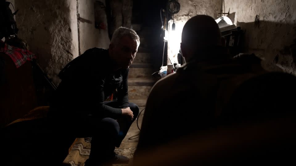 CNN’s Nick Paton Walsh talks to Oleksandr inside a bunker in Lyptsi, Ukraine. - Brice Lainé/CNN