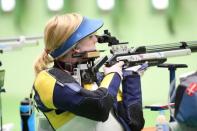Aug 6, 2016; Rio de Janeiro, Brazil; Virginia Thrasher (USA) takes aim during the 10m air rifle qualification at Olympic Shooting Centre. Mandatory Credit: Geoff Burke-USA TODAY Sports