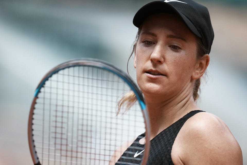 Belarus's Victoria Azarenka looks at her racquet as she played against Russia's Anastasia Pavlyuchenkova during their fourth round match on day 8, of the French Open tennis tournament at Roland Garros in Paris, France, Sunday, June 6, 2021. (AP Photo/Thibault Camus)