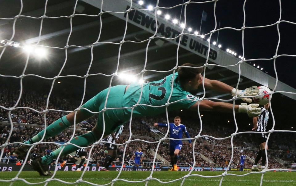 Nick Pope makes a diving save