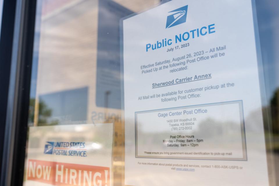 A public notice is posted on the windows to the Sherwood Carrier Annex informing customers that pickup will soon move to the Gage Center Post Office.