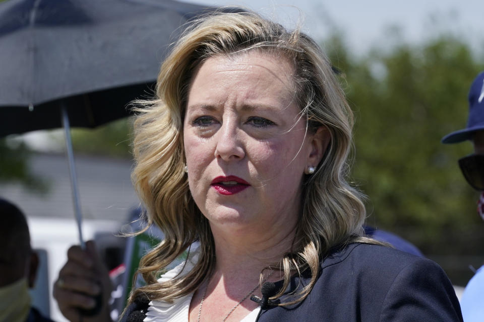 FILE - Rep. Kendra Horn, D-Okla., speaks during a news conference in front of a USPS post office in Oklahoma City, Aug. 18, 2020. Horn is running for Senate in the Nov. 8 election. (AP Photo/Sue Ogrocki, File)