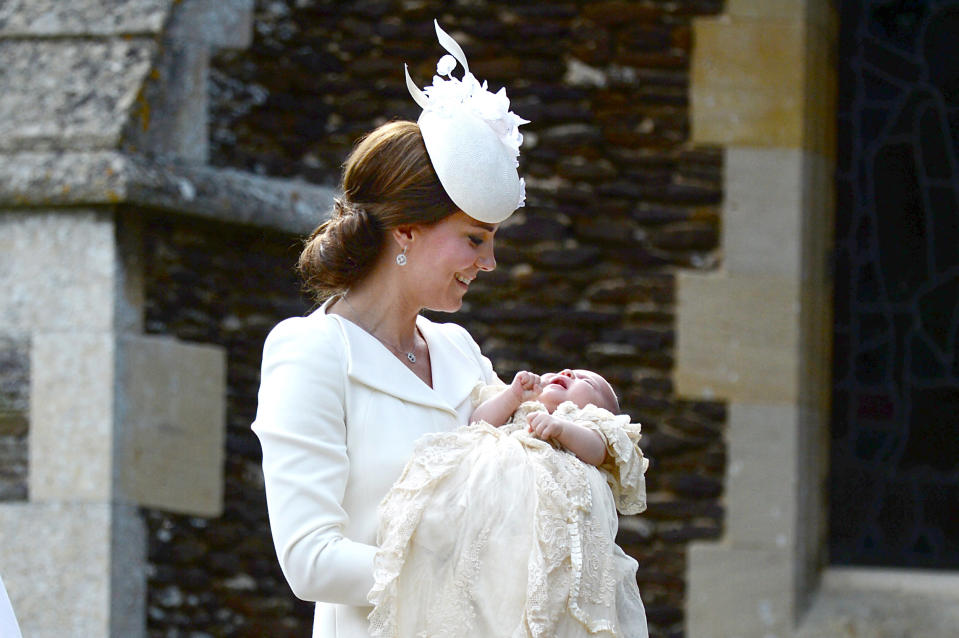 KING'S LYNN, ENGLAND - JULY 05:  Catherine, Duchess of Cambridge and Princess Charlotte of Cambridge arrive at the Church of St Mary Magdalene on the Sandringham Estate for the Christening of Princess Charlotte of Cambridge on July 5, 2015 in King's Lynn, England.  (Photo by Mary Turner - WPA Pool/Getty Images)