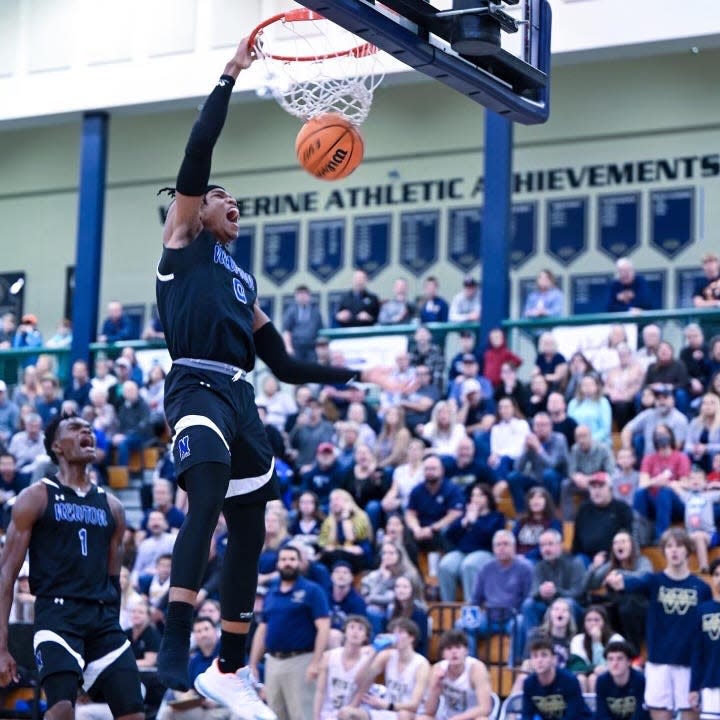 Jakai Newton throws down a dunk for Newton High School in Georgia