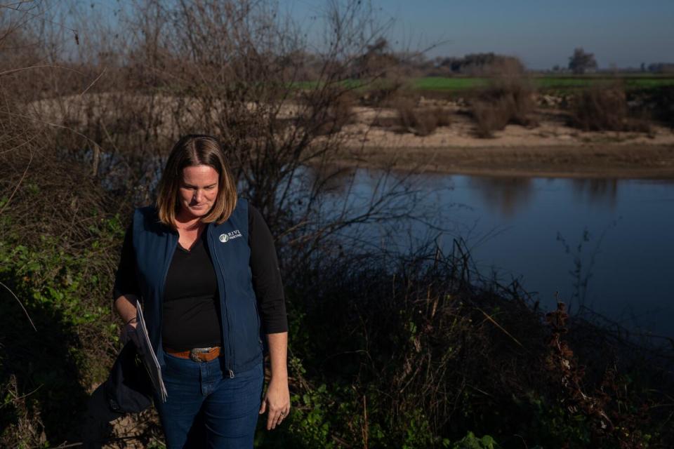 Julie Rentner walks along the Tuolumne River near Modesto.