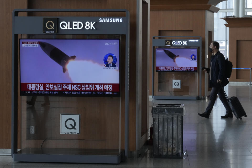 TV screens show a file image of North Korea's missile launch during a news program at the Seoul Railway Station in Seoul, South Korea, Friday, Nov. 18, 2022. North Korea fired a suspected long-range missile designed to strike the mainland U.S. on Friday, its neighbors said, a day after the North resumed its testing activities in an apparent protest over U.S. moves to solidify its alliances with South Korea and Japan. (AP Photo/Ahn Young-joon)