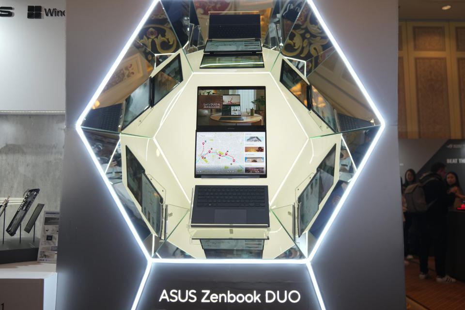 The Asus Zenbook Duo split screen laptop is displayed during the CES tech show Wednesday, Jan. 10, 2024, in Las Vegas. (AP Photo/Ryan Sun)