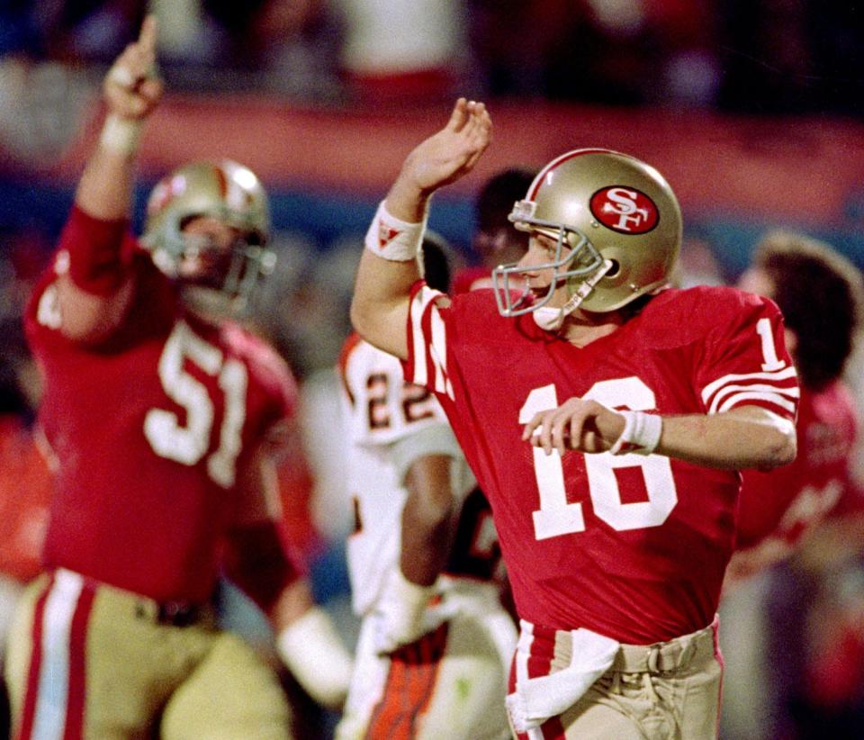 San Francisco quarterback Joe Montana celebrates after he threw the winning touchdown to John Taylor against the Cincinnati Bengals during Super Bowl XXIII in Miami on Jan. 22, 1989.
