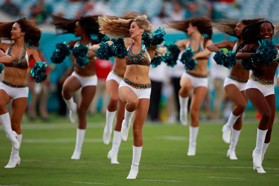 Members of the Roar cheerleading squad perform before a preseason NFL game Aug. 12 at TIAA Bank Field.