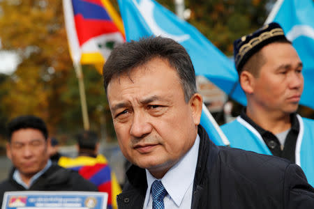 Dolkun Isa, President of the World Uyghur Congress, attends a demonstration against China during its Universal Periodic Review by the Human Rights Council in front of the United Nations Office in Geneva, Switzerland, November 6, 2018. REUTERS/Denis Balibouse