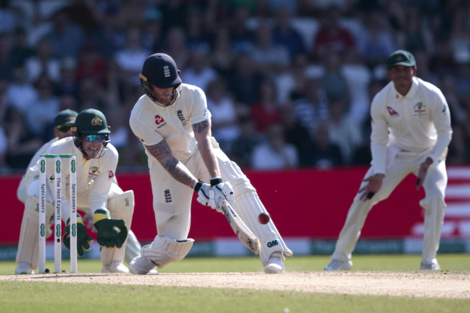 England's Ben Stokes hits a reverse sweep 6 off the bowling of Australia's Nathan Lyon on the fourth day of the 3rd Ashes Test cricket match between England and Australia at Headingley cricket ground in Leeds, England, Sunday, Aug. 25, 2019. (AP Photo/Jon Super)
