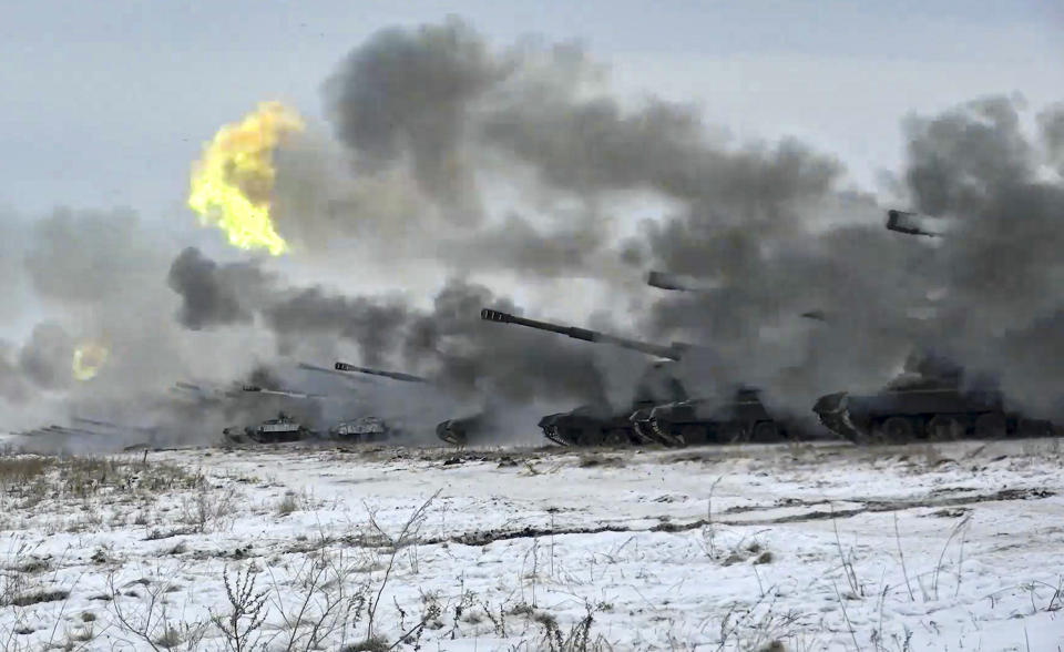 FILE - In this image taken from video and released by Russian Defense Ministry Press Service, Russian army's self-propelled howitzers fire during military drills near Orenburg in the Urals, Russia, Thursday, Dec. 16, 2021. Russia's present demands are based on Putin's purported long sense of grievance and his rejection of Ukraine and Belarus as truly separate, sovereign countries but rather as part of a Russian linguistic and Orthodox motherland. (Russian Defense Ministry Press Service via AP, File)