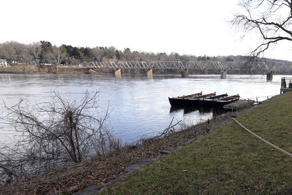 FILE - This Tuesday Dec. 25, 2018 file photo shows the Delaware River at Washington Crossing, Pa. On Thursday, Feb. 25, 2021, the Delaware River Basin Commission, a regulatory agency that’s responsible for the water supply of more than 13 million people in four states voted to permanently ban natural gas drilling and fracking in the watershed. (AP Photo/Jacqueline Larma)