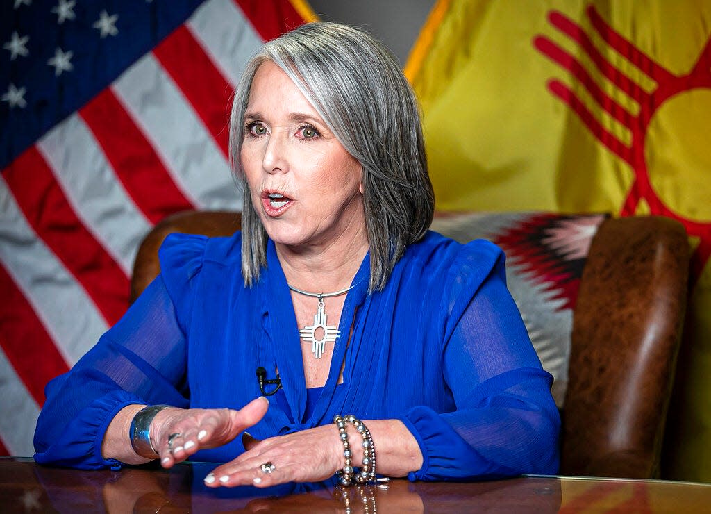 New Mexico Gov. Michelle Lujan Grisham delivers the State of the State address during the 56th legislative session Tuesday, Jan. 18, 2022, in Santa Fe, N.M. Her State of the State address was delivered live but remote from her office as lawmakers gathered in their chambers at the state capitol.