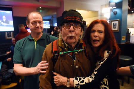 Punters pose for a photograph at a pub in Redcar, Britain March 1, 2019. REUTERS/Clodagh Kilcoyne/Files