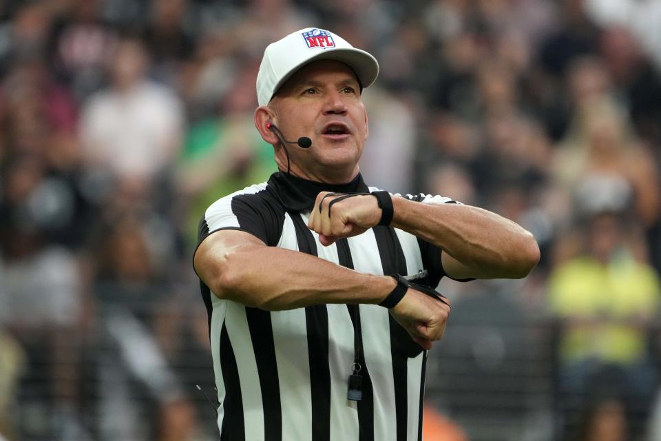 NFL referee Clete Blakeman calls an illegal procedure penalty in the second half of the game between the Las Vegas Raiders and the Arizona Cardinals at Allegiant Stadium, Sept. 18, 2022 in Paradise, Nevada.