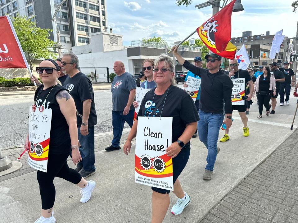 Members of the Public Service Alliance of Canada march down Park Street demanding a contract with the federal government on Monday May 13, 2024.