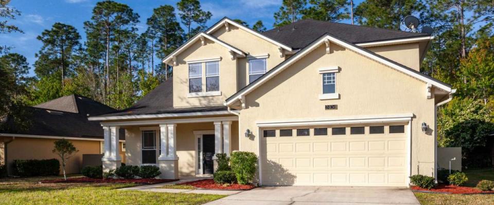 Fleming Island, Florida / USA - April 25 2020: Nice two story home with a garage