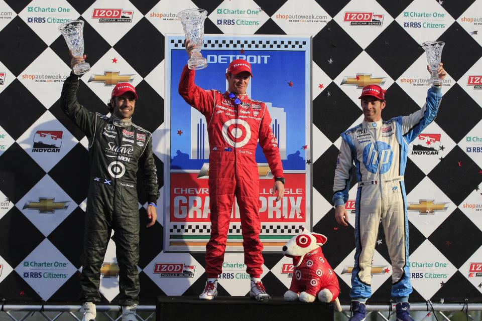 From left, Dario Franchitti, of Scotland, Scott Dixon, of New Zealand, and Simon Pagenaud, of France, stand on the podium after IndyCar's Detroit Grand Prix auto race on Belle Isle in Detroit, Sunday, June 3, 2012. Dixon won the race, while Franchitti came in second and Pagenaud finished third. (AP Photo/Carlos Osorio)