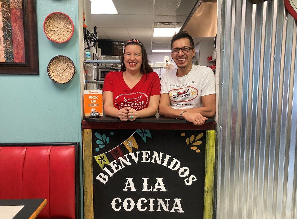 Heather and Chris Gutierrez, of Newark, inside their Hebron restaurant Caliente Mexican Grill. The couple opened the restaurant in May 2021.