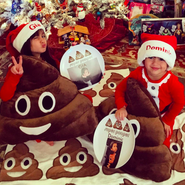 <p>Lopez shared another pic of his children, who must <i>really</i> love the poop emoji: “Pretty crappy Christmas…” (Photo: <a rel="nofollow noopener" href="https://www.instagram.com/p/BOcokUdjtXF/" target="_blank" data-ylk="slk:Instagram;elm:context_link;itc:0" class="link ">Instagram</a>) </p>