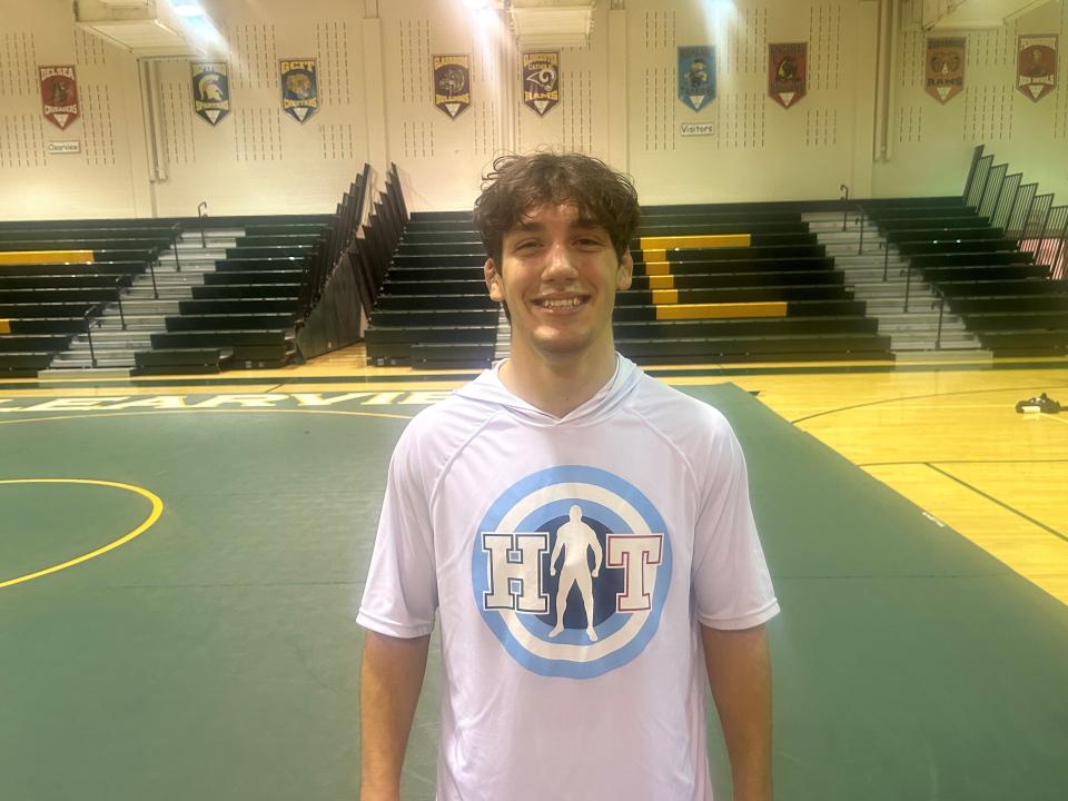 Highland/Triton's Mikey Williams earned his 100th career win on the mat Tuesday night.