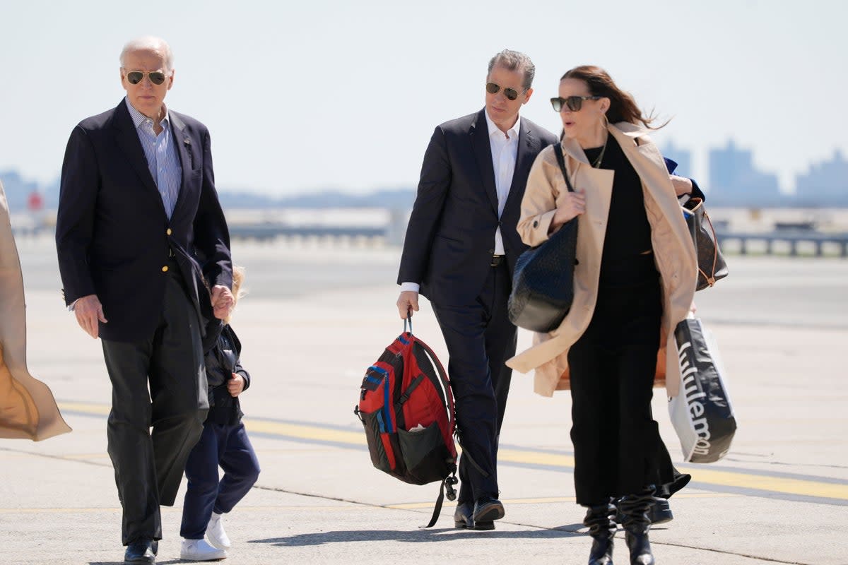 President Joe Biden walks with children Hunter and Ashley. Both Ashley and Hunter have seen personal information fall into the hands of right-wing activists (AP)