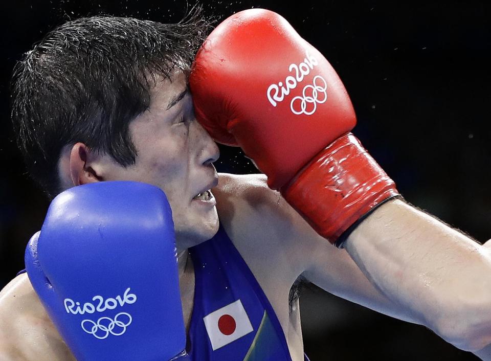 Japan’s Arashi Morisaka gets punched at Olympics