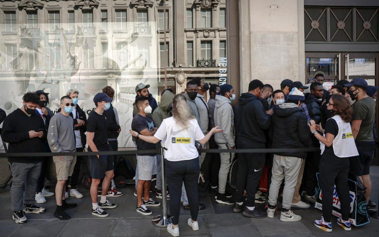 The queue to get into Niketown last week as it reopened to the public - Matt Dunham  /AP