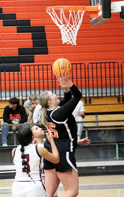 Artesia's Lorin Wagner drives the basket during a Dec. 7, 2023 game against Deming in Artesia.