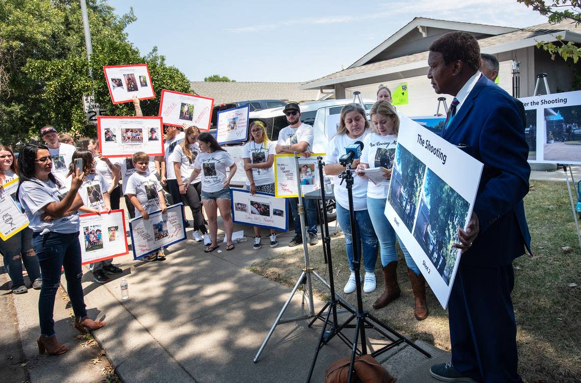 Brittoni Estrella, wife of Paul Chavez Jr., talks to the media as relatives and friends gather on Entrada Way in Modesto on Tuesday for a news conference to announce a wrongful death lawsuit for the fatal shooting of Chavez on July 14 by Modesto Police. Photographed in Modesto, Calif., on Tuesday, July 26, 2022.