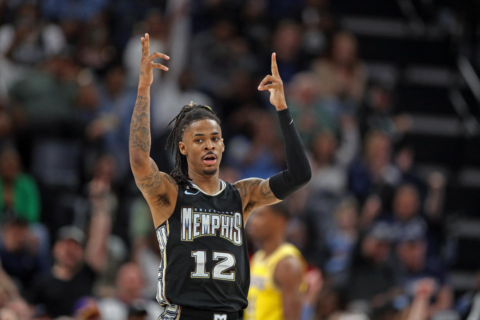 MEMPHIS, TENNESSEE - FEBRUARY 28: Ja Morant #12 of the Memphis Grizzlies reacts during the game against the Los Angeles Lakers at FedExForum on February 28, 2023 in Memphis, Tennessee. NOTE TO USER: User expressly acknowledges and agrees that, by downloading and or using this photograph, User is consenting to the terms and conditions of the Getty Images License Agreement. (Photo by Justin Ford/Getty Images)