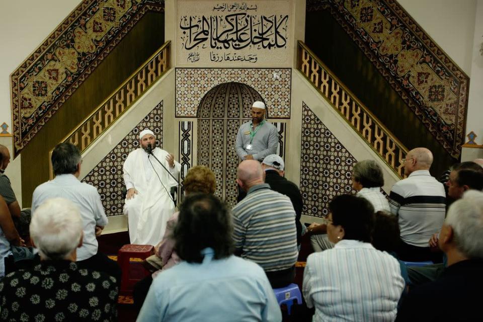 <b>SYDNEY, AUSTRALIA:</b> Lebanon-born Imam Sheik Safi addresses the sudience during a Q&A during the Lakemba Mosque Open Day in Sydney, Australia. Also known as the Imam Ali Bin Abi Taleb Mosque, it is one of the largest mosques in Australia.
