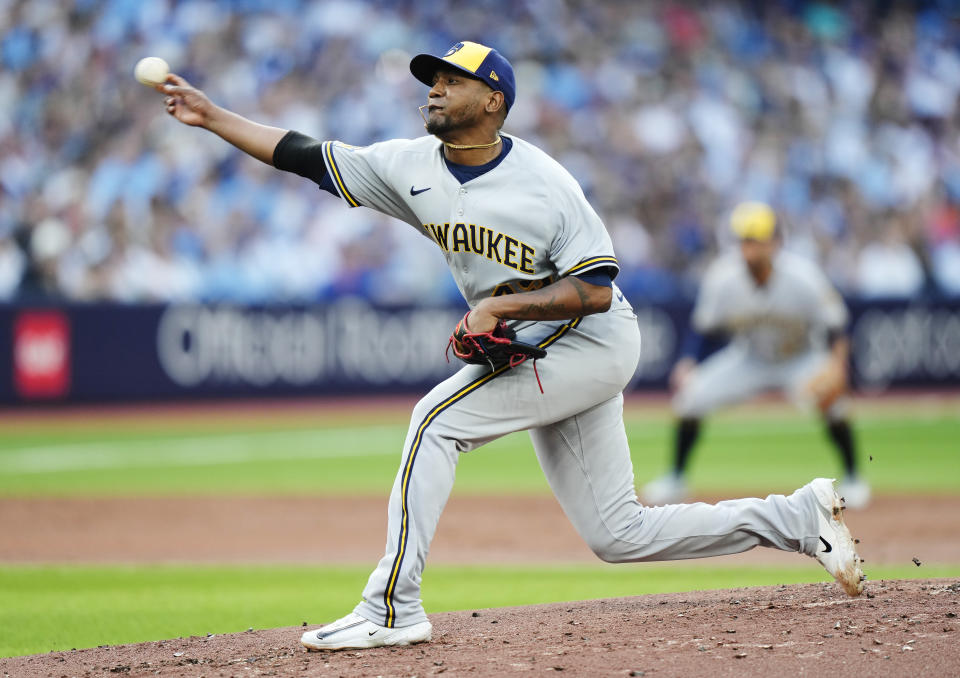 Milwaukee Brewers starting pitcher Julio Teheran works against the Toronto Blue Jays during the first inning of a baseball game Wednesday, May 31, 2023, in Toronto. (Frank Gunn/The Canadian Press via AP)