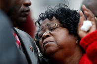 Judy Scott is comforted by her son Rodney after a hung jury was announced in the trial of former North Charleston police officer Michael Slager outside the Charleston County Courthouse in Charleston, South Carolina December 5, 2016. REUTERS/Randall Hill