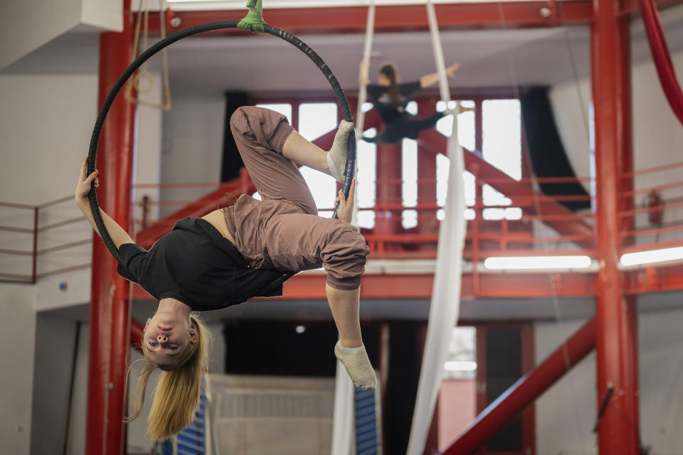 Ukrainian refugee circus student Mariia Lysytska practicing in a training room in Budapest, Hungary, Monday, Feb. 13, 2023. More than 100 Ukrainian refugee circus students, between the ages of 5 and 20, found a home with the Capital Circus of Budapest after escaping the embattled cities of Kharkiv and Kyiv amid Russian bombings. (AP Photo/Denes Erdos)