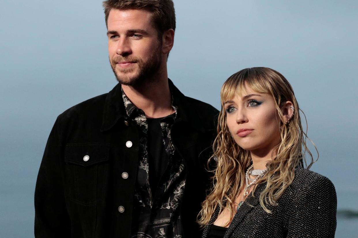 US singer Miley Cyrus and husband Australian actor Liam Hemsworth: AFP/Getty Images