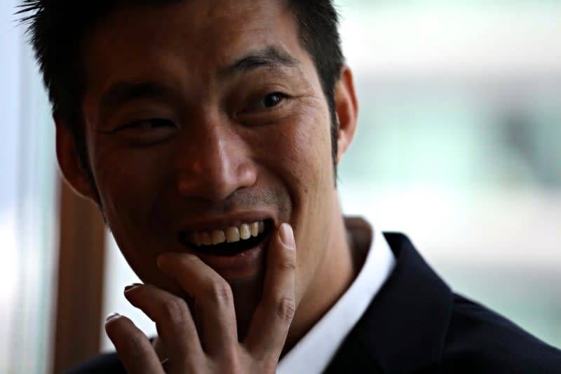 Thailand's opposition Future Forward Party leader Thanathorn Juangroongruangkit is pictured before hearing the verdict from the Constitutional Court at the party headquarters in Bangkok