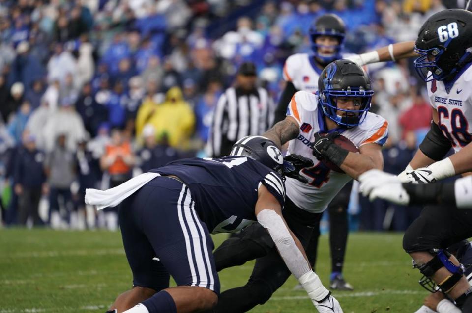 Boise State running back Cyrus Habibi-Likio carries the ball during the Broncos’ 26-17 win at BYU on Saturday. Habibi-Likio led the Broncos with 75 rushing yards and caught five passes for 32 yards.