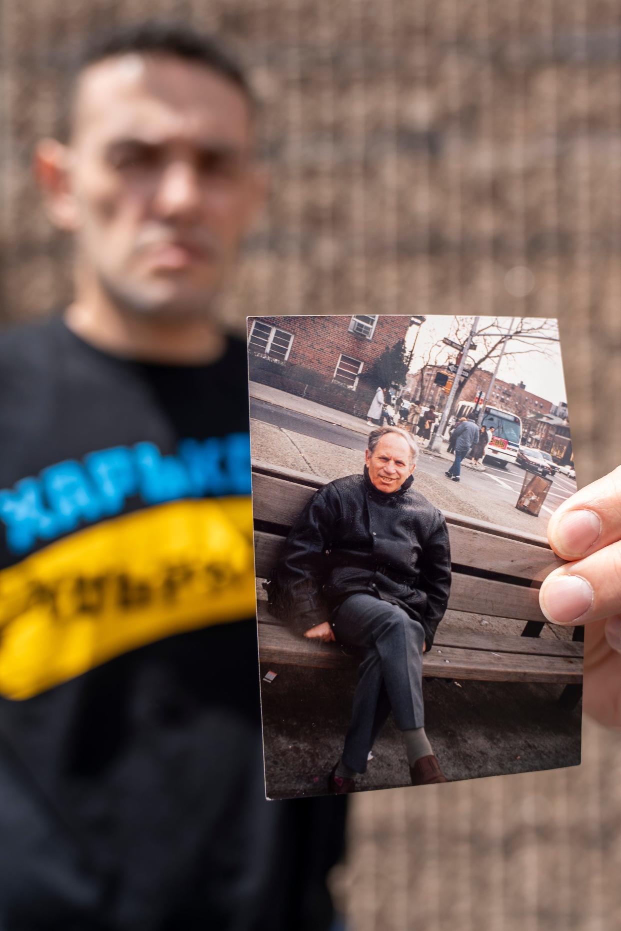 May 8, 2024; Teaneck, N.J.; Slava Koza holds a photo of his grandfather, Boris Tulman, who survived the Nazi invasion of Russia during the Holocaust with the help of a woman named Maria Petrovna Svyatoshova.