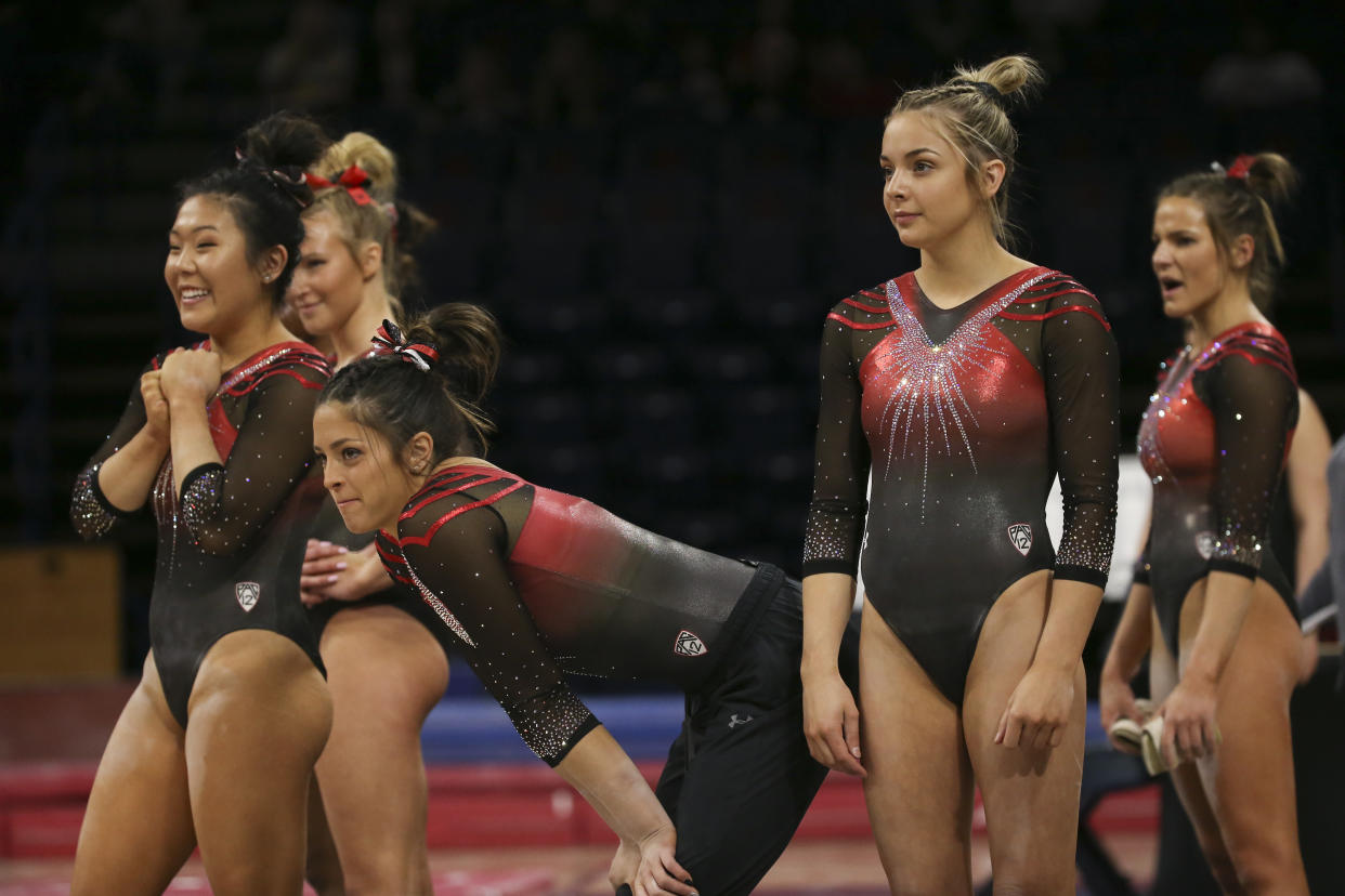 TUCSON, AZ - FEBRUARY 01: Members of Utah watch as a teammate preform on floor during a college gymnastics meet between the Utah Utes and the Arizona Wildcats on February 01, 2020, at McKale Center in Tucson, AZ. (Photo by Jacob Snow/Icon Sportswire via Getty Images)